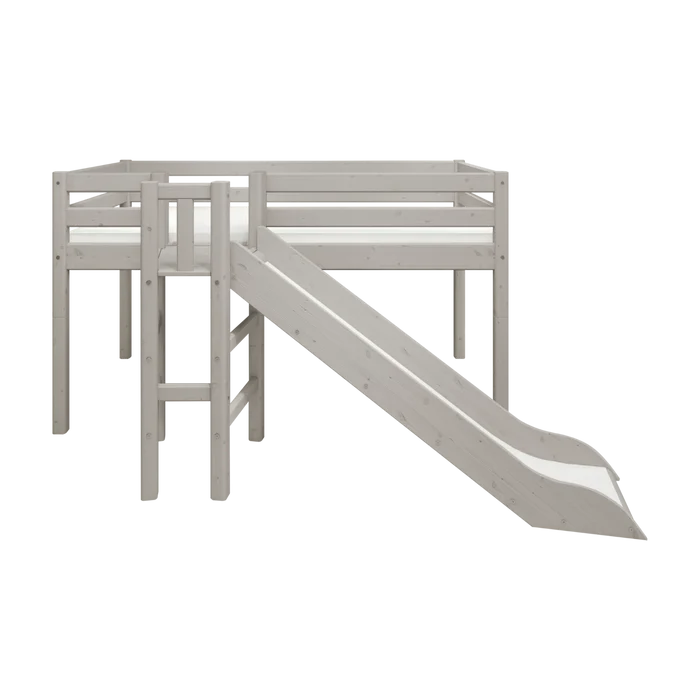 FLEXA grey divided safety rail on solid pine MID-HIGH LOFT bed with left ladder, right slide in bright children’s room.