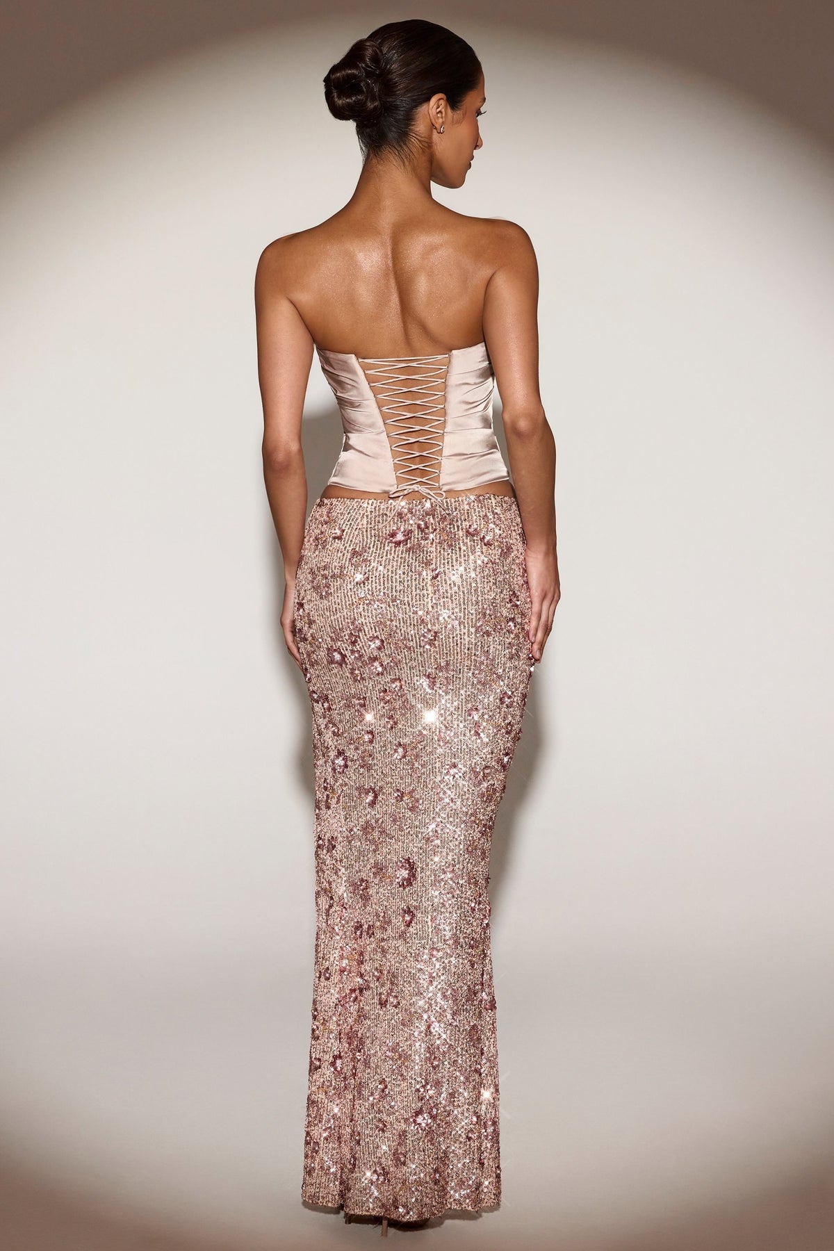 Embellished Mid-Rise Thigh-Split Maxi Skirt in Rose Gold