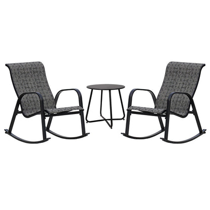 Two rocking chairs with a small table on a white background