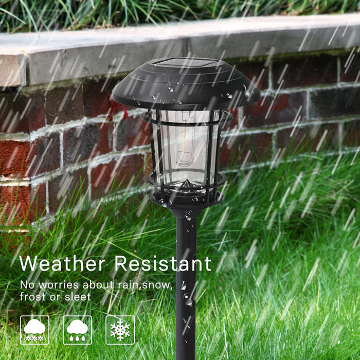 Solar garden light in rain with text 'Weather Resistant' on grass and brick wall background