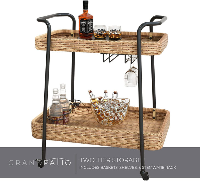 Two-tiered rattan serving cart with bottles and glasses on a white background