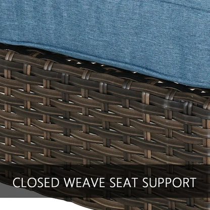Close-up of a wicker chair with blue cushion and 'Closed Weave Seat Support' text.