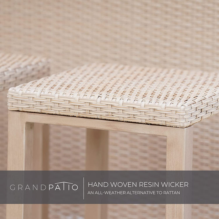 Close-up of a woven resin wicker chair with 'GrandPatio' branding.