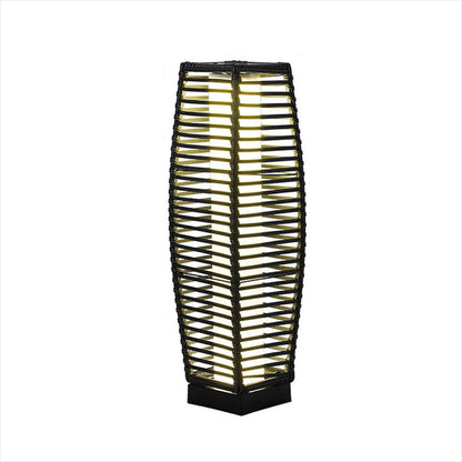 Grand Patio outdoor solar-powered crossover woven resin wicker floor lamp in a tall, elongated shape with a black finish.
