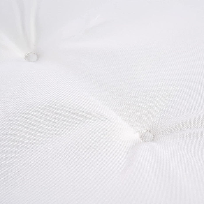 White wall with two light fixtures on a white background