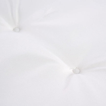 White wall with two light fixtures on a white background