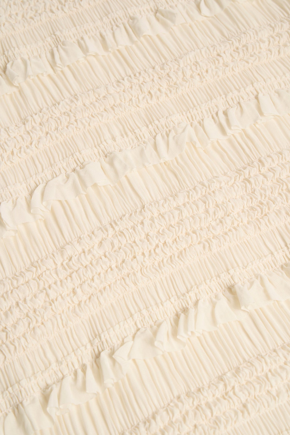 Ruffled High-Neck Backless Top in Ivory
